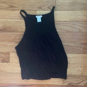 Cute shirt for summer goes great with high waisted pants .